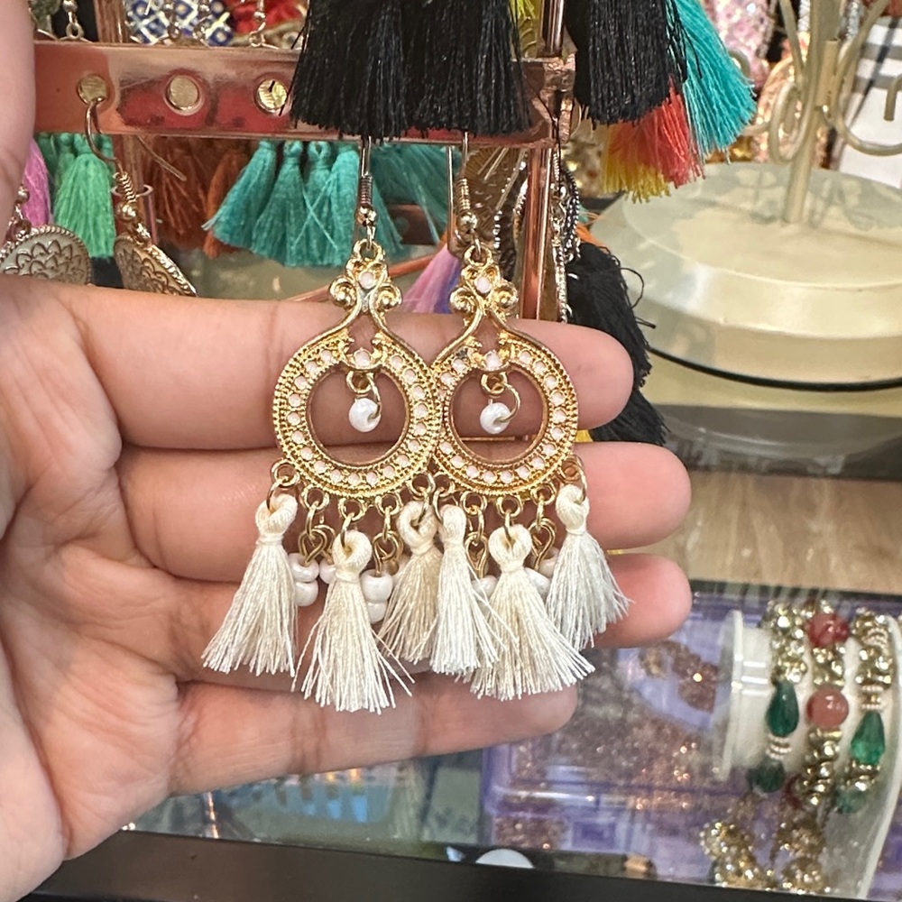 Elegant Gold and Cream Tassel Earrings